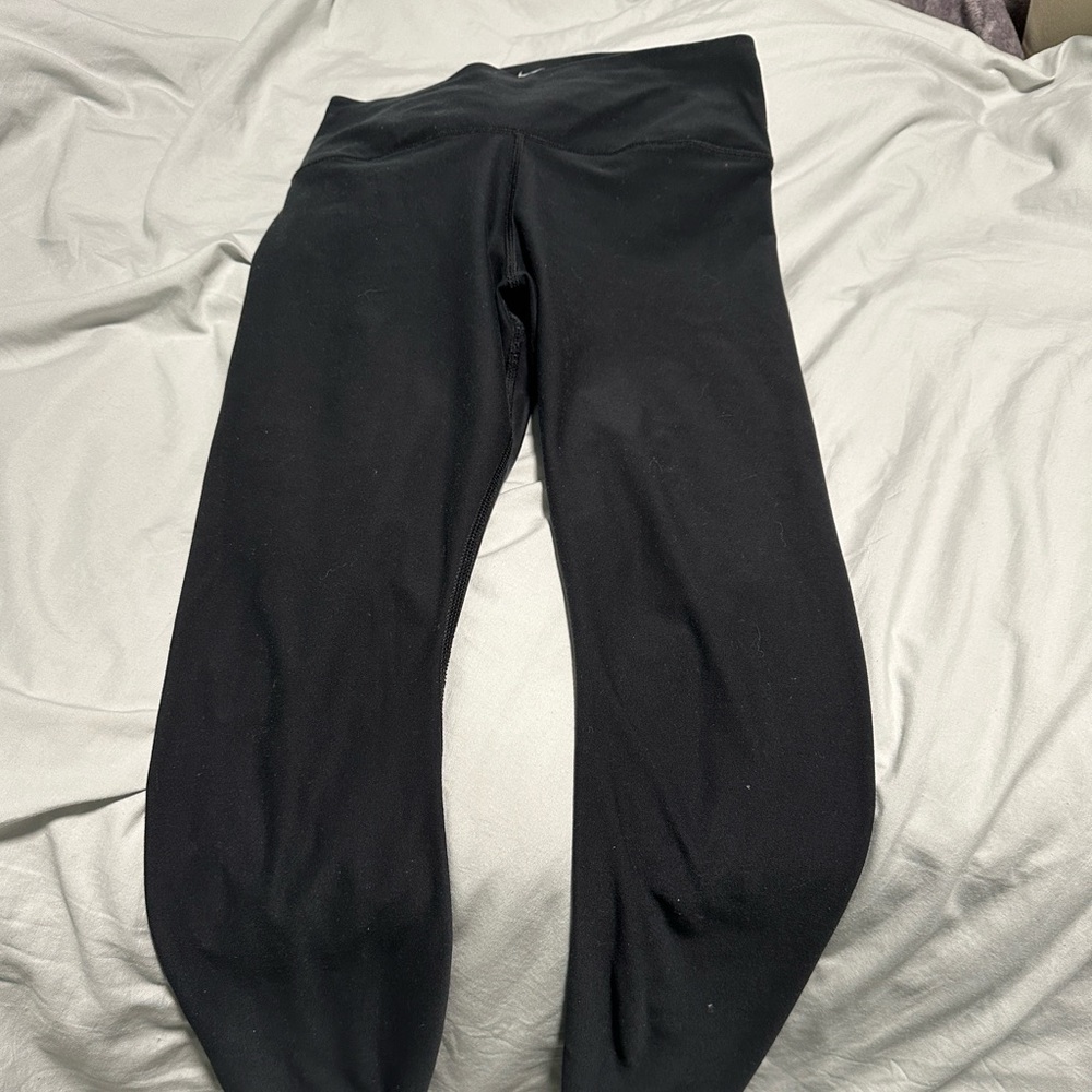 These are a Nike women’s leggings, they are black,